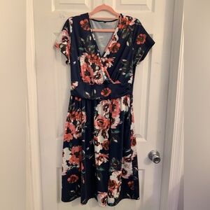 Women’s Floral V-Neck midi Dress. Size large $10
